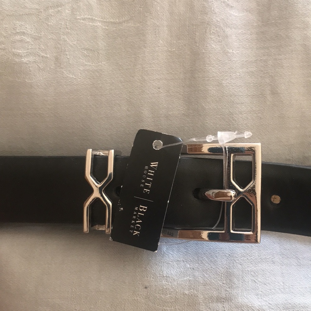 Brand new Women’s black belt. Size Medium. With tag.